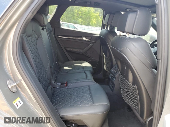 2023 Audi SQ5 Premium Plus z VIN WA1B4AFY4P2083151, wystawiony jako Copart lot #58185645 z przebiegiem 57 751 mil mil oraz Szkoda całkowita • Salvage title. Historia ofert i sprzedaży dostępna na DreamBid. Obrazek 11.