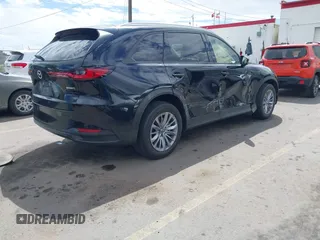 2024 Mazda CX-90 Preferred Plus z VIN JM3KKCHD8R1112555, wystawiony jako IAAI lot #42260744 z przebiegiem 16 528 mil mil oraz . Historia ofert i sprzedaży dostępna na DreamBid. Obrazek 4.