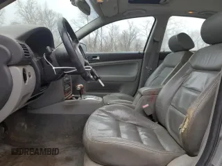 2003 Volkswagen Passat GLX z VIN WVWRH63B53P198926, wystawiony jako Copart lot #46875345 z przebiegiem 185 075 mil mil oraz Szkoda całkowita • Salvage title. Historia ofert i sprzedaży dostępna na DreamBid. Obrazek 7.