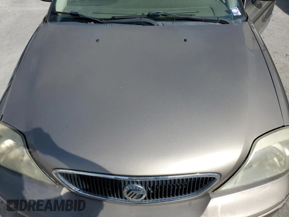2003 Mercury Sable LS Premium z VIN 1MEFM59S03A606329, wystawiony jako Copart lot #79331624 z przebiegiem 152 059 mil mil oraz Nie do naprawy. Historia ofert i sprzedaży dostępna na DreamBid. Obrazek 11.