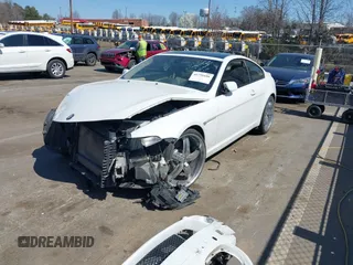2005 BMW 6 Series 645Ci with VIN WBAEH73465B191566, listed as a IAAI auction lot 41790186 with Not Provided miles and . Bid and sale history available at carsss.com. Image 17.