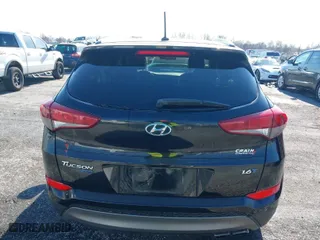 2016 Hyundai Tucson Limited with VIN KM8J33A27GU237225, listed as a IAAI auction lot 41223497 with 158,986 mi miles. Bid and sale history available at carsss.com. Image 16.