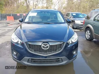 2015 Mazda CX-5 Grand Touring with VIN JM3KE4DY7F0478823, listed as a IAAI auction lot 40731626 with 82,884 mi miles. Bid and sale history available at carsss.com. Image 12.