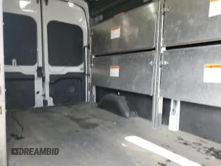 2023 Ford Transit Cargo с VIN 1FTBR2X88PKA66512, выставлен на аукционе Copart как лот 58451445 с пробегом 74 819 миль миль и Списание • Salvage title. История ставок и продаж доступна на DreamBid. Изображение 11.