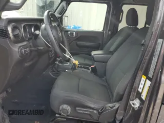 2019 Jeep Wrangler Unlimited Sport with VIN 1C4HJXDG0KW540190, listed as a Copart auction lot 42140675 with 66,470 mi miles and Salvage title. Bid and sale history available at DreamBid. Image 7.