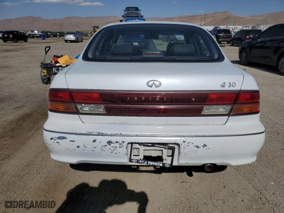 1996 Infiniti I30 with VIN JNKCA21D5TT309858, listed as a Copart auction lot 62526004 with NaN miles and Salvage Title. Bid and sale history available at carsss.com. Image 6.