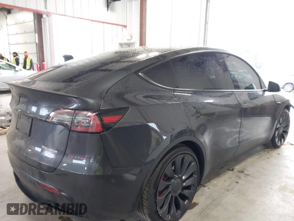 2024 Tesla Model Y Performance with VIN 7SAYGDEFXRF049338, listed as a IAAI auction lot 41240812 with 10,132 mi miles and . Bid and sale history available at DreamBid. Image 4.