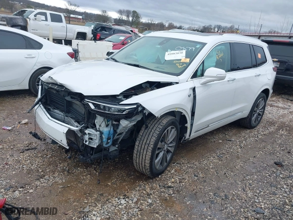2021 Cadillac XT6 Premium Luxury with VIN 1GYKPFRS0MZ100879, listed as a IAAI auction lot 41083030 with 56,502 mi miles. Bid and sale history available at carsss.com. Image 2.