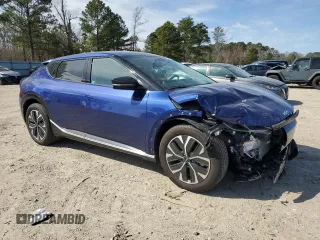 2023 Kia EV6 Wind with VIN KNDC34LA6P5607601, listed as a Copart auction lot 47719015 with 7,604 mi miles and Salvage Title. Bid and sale history available at carsss.com. Image 4.