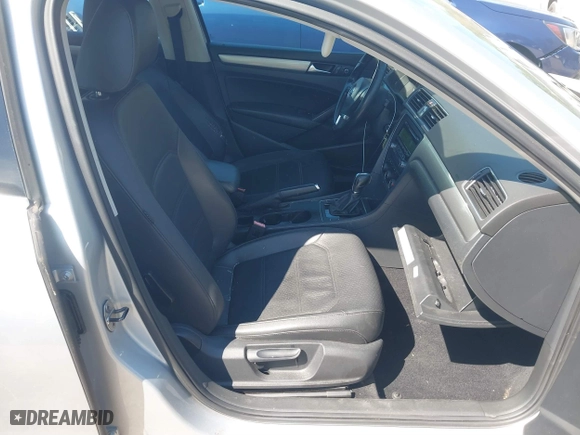 2014 Volkswagen Passat Wolfsburg Ed with VIN 1VWAS7A32EC048814, listed as a IAAI auction lot 41858198 with 112,436 mi miles. Bid and sale history available at carsss.com. Image 5.