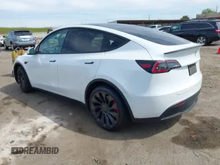 2021 Tesla Model Y Performance z VIN 5YJYGDEF7MF277769, wystawiony jako IAAI lot #42025157 z przebiegiem 28 522 mil mil oraz . Historia ofert i sprzedaży dostępna na DreamBid. Obrazek 3.