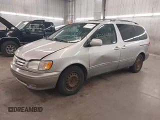 2001 Toyota Sienna LE z VIN 4T3ZF13C31U324428, wystawiony jako IAAI lot #42238030 z przebiegiem 209 762 mil mil oraz . Historia ofert i sprzedaży dostępna na DreamBid. Obrazek 2.