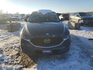 2021 Mazda CX-5 Touring with VIN JM3KFACM2M0329646, listed as a Copart auction lot 88217245 with 46,864 mi miles and Salvage Title. Bid and sale history available at carsss.com. Image 5.