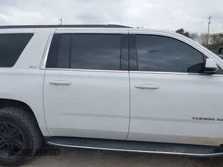 2019 GMC Yukon XL SLT with VIN 1GKS1GKC1KR384332, listed as a IAAI auction lot 41232450 with 109,219 mi miles. Bid and sale history available at carsss.com. Image 14.