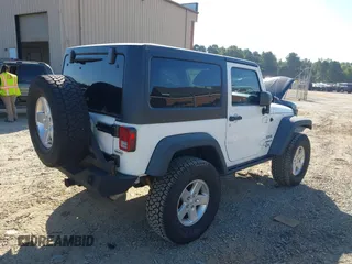 2014 Jeep Wrangler Sport with VIN 1C4AJWAG5EL176998, listed as a IAAI auction lot 40585450 with 114,432 mi miles and . Bid and sale history available at DreamBid. Image 4.