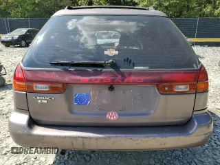 1995 Subaru Legacy L with VIN 4S3BK6353S7328522, listed as a Copart auction lot 71933944 with 60,105 mi miles and Salvage title. Bid and sale history available at DreamBid. Image 6.