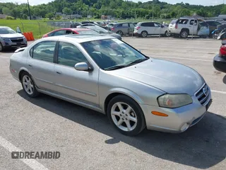 2003 Nissan Maxima SE z VIN JN1DA31D33T513282, wystawiony jako IAAI lot #42289710 z przebiegiem 343 973 mil mil oraz . Historia ofert i sprzedaży dostępna na DreamBid. Obrazek 1.