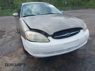 2003 Ford Taurus SE Standard with VIN 1FAFP53U63G125751, listed as a IAAI auction lot 41933803 with 196,710 mi miles. Bid and sale history available at carsss.com. Image 6.