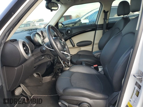 2012 MINI Countryman S with VIN WMWZC3C52CWP20082, listed as a Copart auction lot 47286305 with 60,968 mi miles and Salvage Title. Bid and sale history available at DreamBid. Image 7.