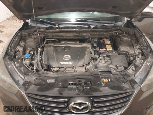 2016 Mazda CX-5 Grand Touring with VIN JM3KE4DY0G0732843, listed as a IAAI auction lot 41520889 with 149,798 mi miles. Bid and sale history available at carsss.com. Image 10.