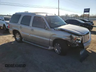 2004 Cadillac Escalade z VIN 1GYEC63T04R107597, wystawiony jako Copart lot #87259974 z przebiegiem Nie podano mil oraz Nie do naprawy • Non repairable. Historia ofert i sprzedaży dostępna na DreamBid. Obrazek 4.