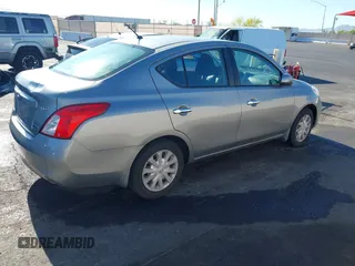2012 Nissan Versa SV with VIN 3N1CN7AP0CL921230, listed as a IAAI auction lot 42151993 with 184,676 mi miles. Bid and sale history available at carsss.com. Image 4.