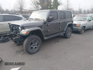 2021 Jeep Wrangler Unlimited Sahara z VIN 1C4JJXP68MW745098, wystawiony jako IAAI lot #41461092 z przebiegiem 36 410 mil mil oraz . Historia ofert i sprzedaży dostępna na DreamBid. Obrazek 18.