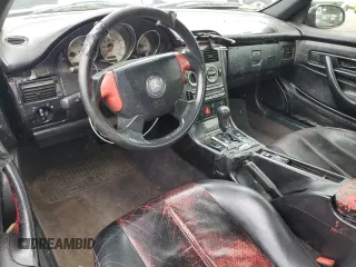 1998 Mercedes-Benz SLK-Class with VIN WDBKK47F3WF034409, listed as a Copart auction lot 71972994 with 203,772 mi miles and Salvage Title. Bid and sale history available at carsss.com. Image 8.