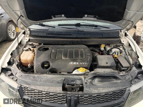 2015 Dodge Journey Crossroad with VIN 3C4PDDGG6FT601017, listed as a Copart auction lot 55485625 with 102,698 mi miles and Salvage title. Bid and sale history available at DreamBid. Image 12.
