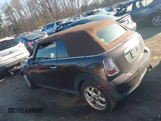 2011 MINI Convertible with VIN WMWZN3C55BT133367, listed as a IAAI auction lot 41781374 with 124,036 mi miles and . Bid and sale history available at DreamBid. Image 14.