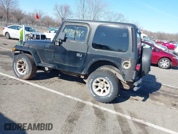 1997 Jeep Wrangler SE with VIN 1J4FY29P6VP438125, listed as a IAAI auction lot 41770455 with 163,001 mi miles. Bid and sale history available at carsss.com. Image 3.