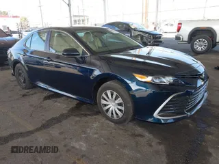 2021 Toyota Camry Hybrid LE with VIN 4T1C31AK5MU566479, listed as a IAAI auction lot 41008865 with 25,703 mi miles. Bid and sale history available at carsss.com. Image 1.