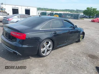 2014 Audi S6 Prestige z VIN WAUF2AFC9EN058417, wystawiony jako IAAI lot #42236333 z przebiegiem 58 257 mil mil oraz . Historia ofert i sprzedaży dostępna na DreamBid. Obrazek 4.