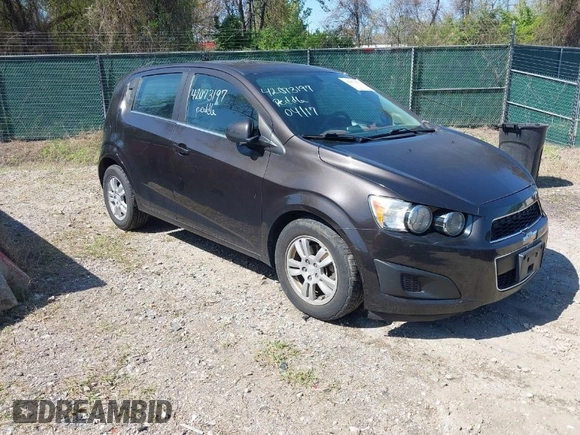 2014 Chevrolet Sonic LT with VIN 1G1JC6SB6E4210561, listed as a IAAI auction lot 42073197 with 100,945 mi miles. Bid and sale history available at carsss.com. Image 1.