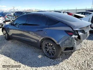2023 Tesla Model 3 with VIN 5YJ3E1EA3PF575503, listed as a Copart auction lot 49909295 with 33,386 mi miles and Salvage Title. Bid and sale history available at carsss.com. Image 2.