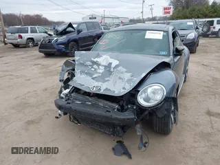 2012 Volkswagen Beetle with VIN 3VWV67AT0CM663718, listed as a IAAI auction lot 41860510 with 99,932 mi miles and . Bid and sale history available at DreamBid. Image 20.
