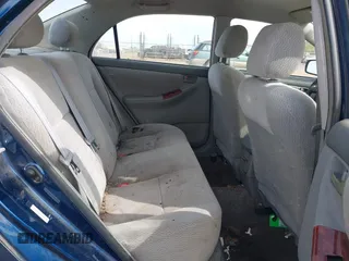 2004 Toyota Corolla CE with VIN JTDBR38E042034109, listed as a IAAI auction lot 42054614 with 162,116 mi miles. Bid and sale history available at carsss.com. Image 8.