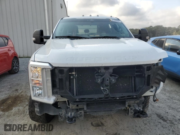 2023 Ford F-250 XL z VIN 1FT7W2BA4PEC15697, wystawiony jako Copart lot #78132664 z przebiegiem 30 001 mil mil oraz Szkoda całkowita • Salvage title. Historia ofert i sprzedaży dostępna na DreamBid. Obrazek 5.