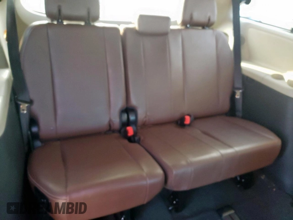 2015 Toyota Sienna XLE with VIN 5TDYK3DC1FS618338, listed as a Copart auction lot 63567755 with 119,596 mi miles and Salvage title. Bid and sale history available at DreamBid. Image 10.