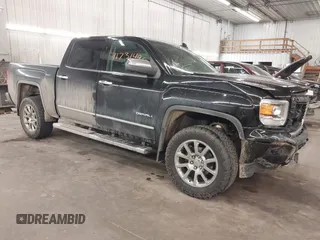 2015 GMC Sierra 1500 Denali with VIN 3GTU2WEC7FG129925, listed as a IAAI auction lot 41731496 with 165,168 mi miles. Bid and sale history available at carsss.com. Image 1.