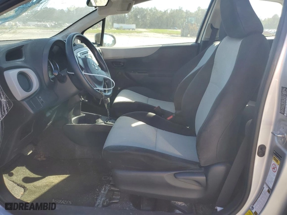 2014 Toyota Yaris L with VIN JTDJTUD31ED588546, listed as a Copart auction lot 74899274 with 65,254 mi miles and Salvage Title. Bid and sale history available at carsss.com. Image 7.