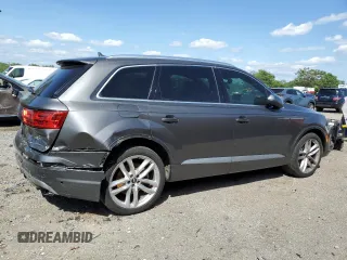 2018 Audi Q7 Prestige with VIN WA1VAAF72JD032076, listed as a Copart auction lot 57638005 with 211,242 mi miles and Salvage title. Bid and sale history available at DreamBid. Image 3.