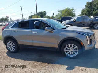 2023 Cadillac XT4 FWD Luxury with VIN 1GYAZAR4XPF116698, listed as a IAAI auction lot 40594015 with 18,368 mi miles. Bid and sale history available at carsss.com. Image 13.
