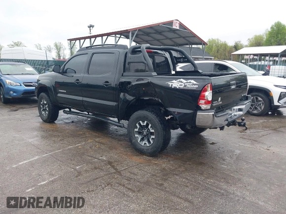 2015 Toyota Tacoma with VIN 3TMLU4ENXFM185371, listed as a IAAI auction lot 41952513 with 87,128 mi miles and . Bid and sale history available at DreamBid. Image 3.
