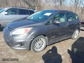 2013 Ford C-Max Hybrid SE with VIN 1FADP5AU6DL544072, listed as a IAAI auction lot 41798270 with 203,489 mi miles. Bid and sale history available at carsss.com. Image 2.