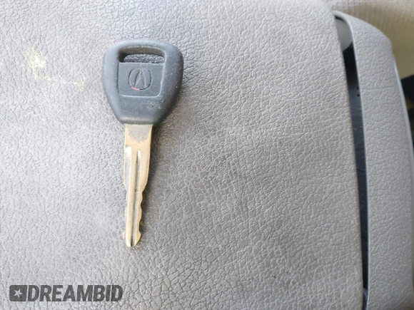 1999 Acura RL with VIN JH4KA9660XC007723, listed as a IAAI auction lot 42039719 with Not provided miles and . Bid and sale history available at DreamBid. Image 11.