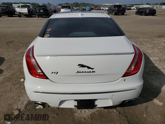 2015 Jaguar XJ with VIN SAJWA1CZ9F8V88418, listed as a Copart auction lot 45547965 with 82,423 mi miles and Salvage Title. Bid and sale history available at carsss.com. Image 6.