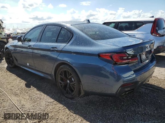 2023 BMW 5 Series M550i xDrive with VIN WBA13BK08PCN51125, listed as a Copart auction lot 76781294 with 8,855 mi miles and Non repairable. Bid and sale history available at DreamBid. Image 2.