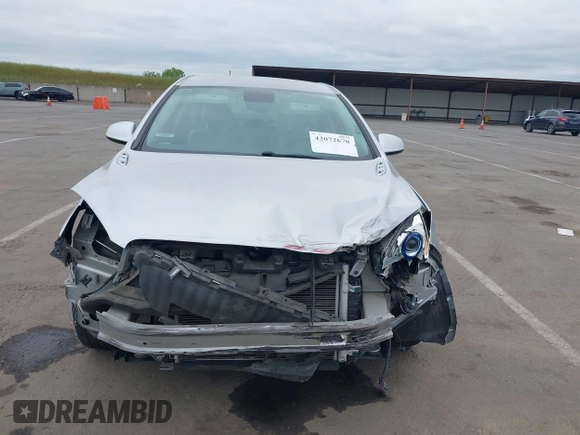 2013 Buick Verano with VIN 1G4PP5SK0D4228466, listed as a IAAI auction lot 42072670 with 72,290 mi miles. Bid and sale history available at carsss.com. Image 6.