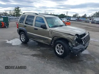 2004 Jeep Liberty Sport with VIN 1J4GK48K54W195211, listed as a IAAI auction lot 41706084 with 151,915 mi miles and . Bid and sale history available at carsss.com. Image 1.